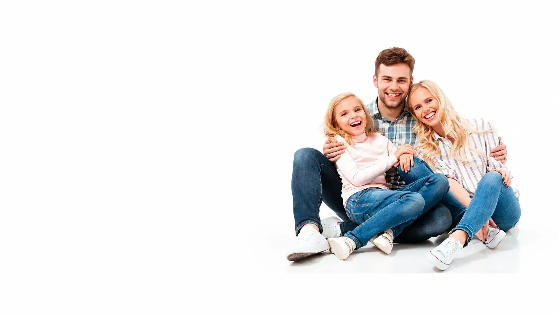 Smiling family sitting together
